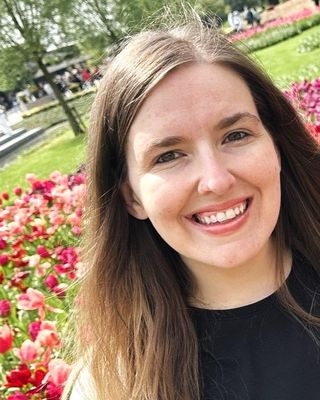 Photo of Madi Musson, Marriage & Family Therapist, ATR-BC, LMFT, EMDR