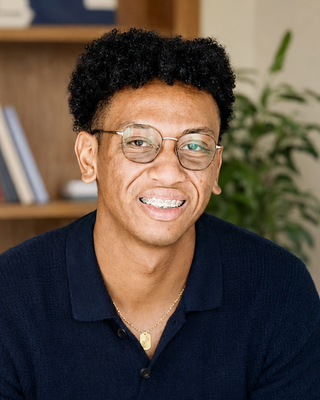 Photo of Micah Koinyan Massaquoi Jr., Licensed Mental Health Counselor, LMHC, NCC