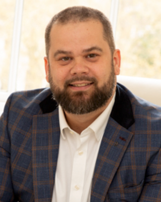 Photo of Dr Daniel Moore, Psychologist, DCounsPsych, CPsychol