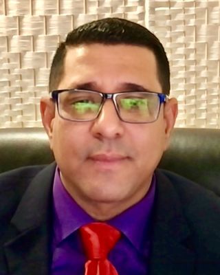 Photo of Dr. Orlando Vega, PhD, LCDC, NCC, BC-TMH, CCTP, Licensed Professional Counselor