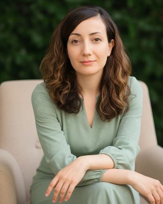 Photo of Dr. Elaheh Raoufi, Registered Psychotherapist, MD, MA, CRPO, CCPA