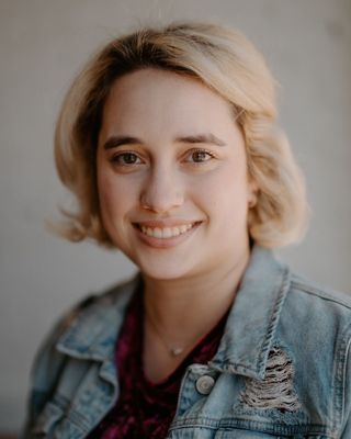 Photo of Jenna Elwell, Licensed Professional Counselor, MA, NCC, CTP, DP-C