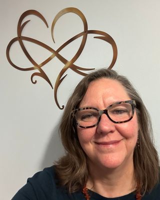 Photo of Rebecca N Schoenewolf, Counselor, MA, LPC, LMHC, RMT