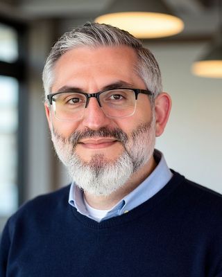 Photo of Ergon Gjika, Counselor, MA, LMHC