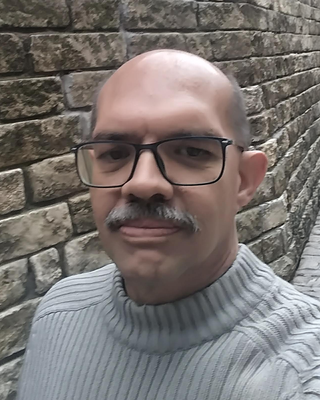 Photo of Filiberto Arturo Medina, Counselor, LPC