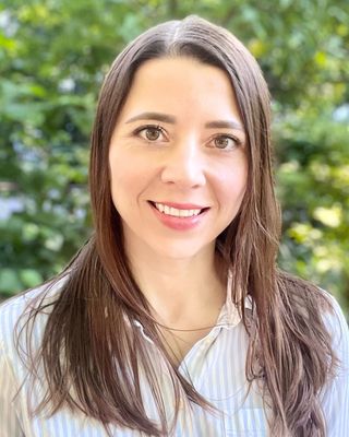 Photo of Dr. Kseniia Gvozdieva, Psychologist, PhD, MBA, CGP