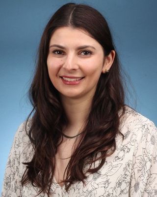 Photo of Milana Davydova, Counselor, MAEd, LMHC, CCTP, NCC, RYT-200