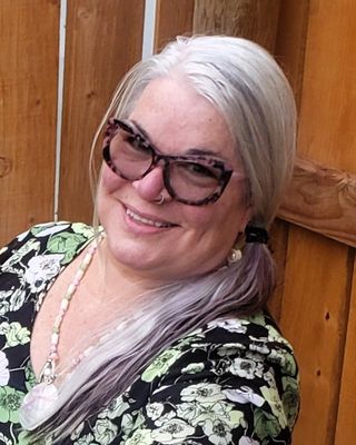 Photo of Rebecca Huston, Licensed Clinical Professional Counselor, MA, LCPC, LPC-S, CHT, NCC