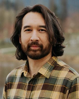 Photo of Arlen Tom, Registered Social Worker, BA, MSW, RSW