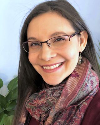 Photo of Gina Raza, PhD, Psychologist 