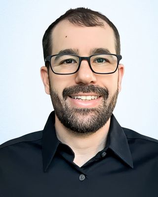 Photo of Eitan Levin, Counselor, LMHC