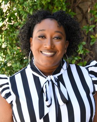 Photo of Karena Curry, MEd, LCMHC, QS, Licensed Professional Counselor 