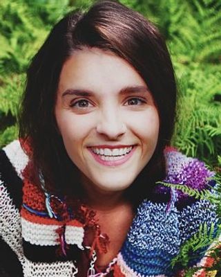 Photo of Caitlin D’Alessandro, Licensed Mental Health Counselor, LMHC, ATR