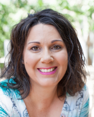 Photo of Dr Kim Elkovich, Counsellor, PhD, ACA-L4