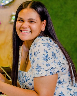 Photo of Yusra Tayob, General Counsellor