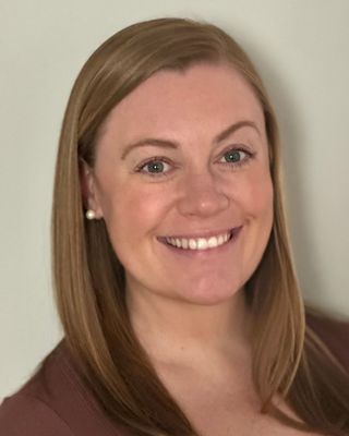 Photo of Brenna Tighe, LMHC, CRC, Counselor