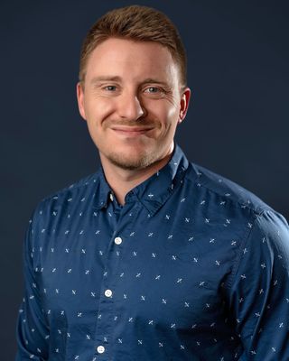 Photo of Carson MacIntyre, Counselor, MS, LCPC