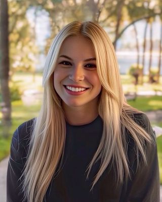 Photo of Dr. Amanda Bauer-Manzella - Dr. Amanda Bauer-Manzella, Ph.D. LMHC , Counselor, PhD, LMHC