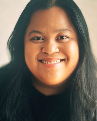 Photo of Cass Manalastas, Licensed Mental Health Counselor, LMHC
