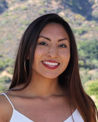 Photo of Briggitte Chavez - Latinx Immigrant, Registered Mental Health Counselor Intern, MS, RMHCI