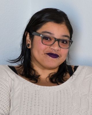 Photo of Justine Marroquin, Counselor, MA, LPCC, ATR-P