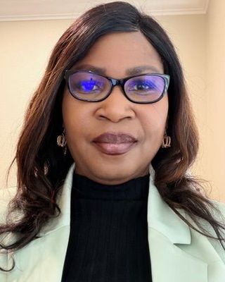 Photo of Dr. Patience Ennih Morikang, Psychiatric Nurse Practitioner, DNP, PMHNPBC