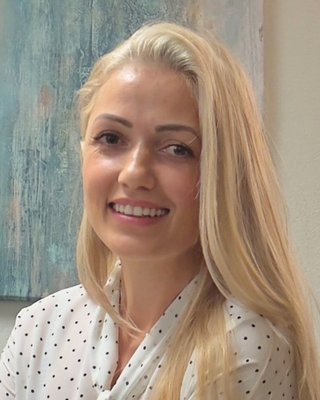 Photo of Mihaela Born, Psychiatric Nurse Practitioner, PMHNP