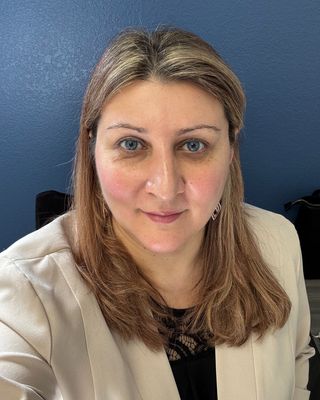Photo of Adina Cazacu - Still Becoming Coaching & Reiki, NBCHWC, CWP, Reiki