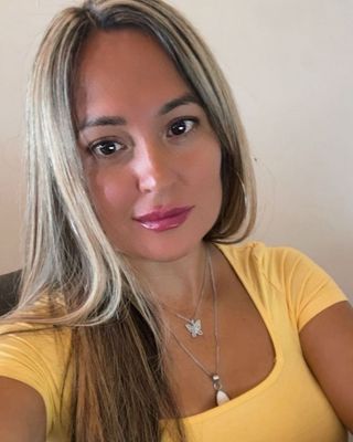 Photo of Aide Reyes, Counselor, LMHC-D, MSEd