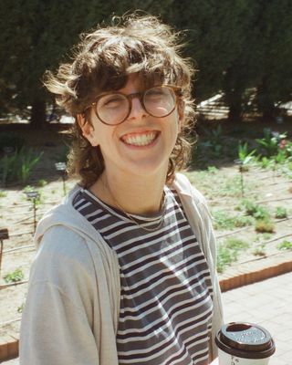 Photo of Avery Spratt, Licensed Professional Counselor, MA, LPC, MFTC