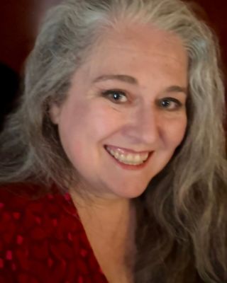Photo of Beth Rousseau, Licensed Mental Health Counselor Associate, LMHCA, MT-BC