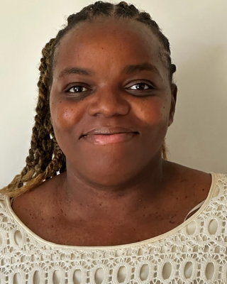 Photo of Consola Esambe Lobwede, Psychiatrist, MD