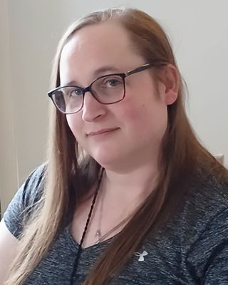 Photo of Natalie Clark, Counselor, MA, MT-BC, LCMHC, CCTP-2