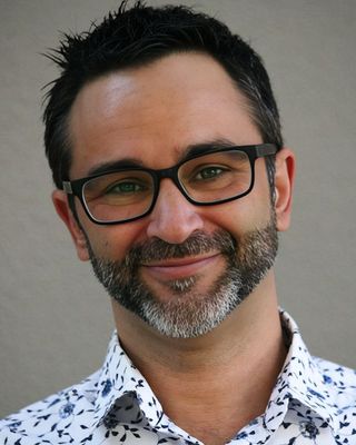 Photo of Dr Andreas Comninos, Psychologist, PhD, MAPS