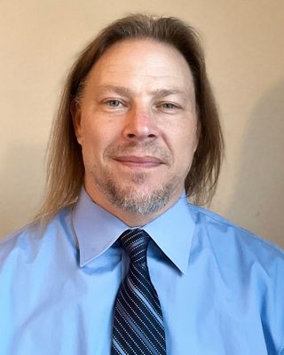 Photo of Jesse Schramm, Licensed Professional Counselor in Eastlake, CO