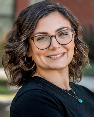 Photo of Dr. Caitlin Stell, Psychologist, PsyD, PMH-C