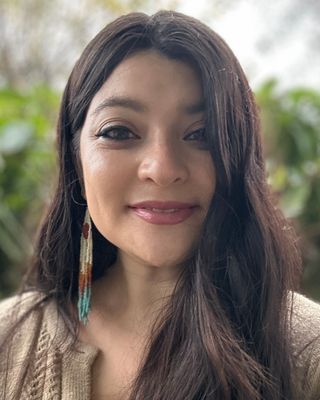 Photo of Midori Hogg, Counselor, MA, LMHCA