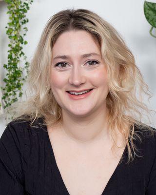 Photo of Emily Howell, Registered Psychotherapist (Qualifying), MA