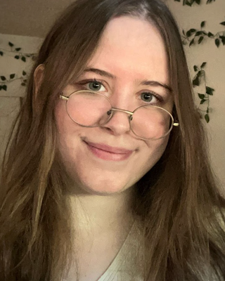 Photo of Abbi Kanouse-Schaefer, Pre-Licensed Professional, BA, (She, They)