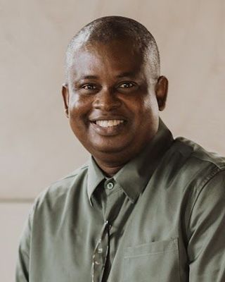 Photo of Emmanuel Ita, Registered Psychotherapist (Qualifying), MACP, PGD, BSc