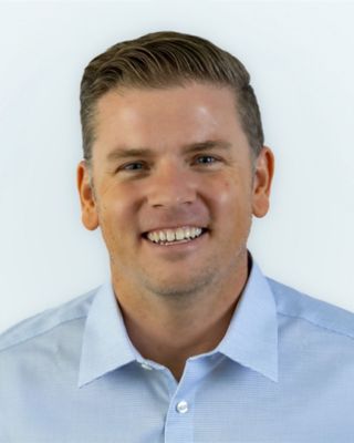 Photo of Micah Kiel, Counselor, MS, MBA, tLMHC