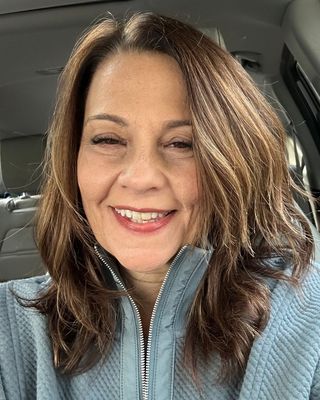 Photo of Michelle Christy, Clinical Social Work/Therapist, LICSW, CADC, EMDR-AC, RYT