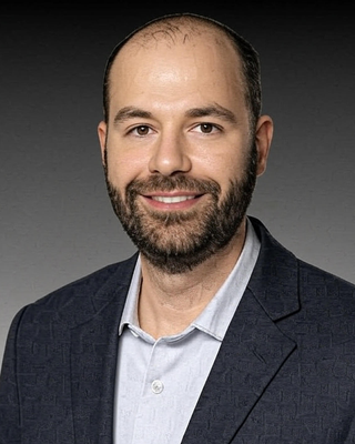 Photo of Dr. Justin T. Carreras, Psychologist, PhD, MP