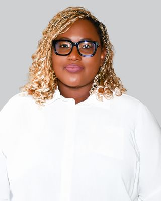 Photo of Judeline Altema-Commey, Licensed Clinical Professional Counselor, LCPC, ACS, C-DBT, CTRP