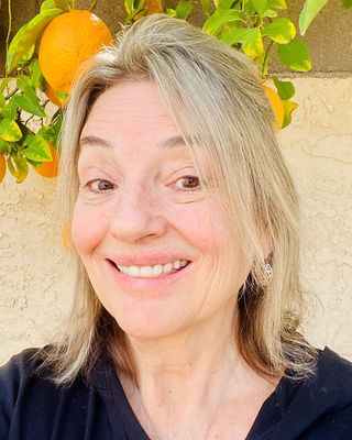 Photo of Amy Williams - House of Wellness Coaching—Amy Williams, Ed.S., EdS, MA, NBC-HWC, RYT, CHT