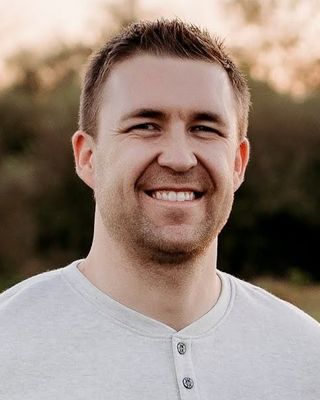 Photo of Dr. Jaxson Judkins, Counselor, PhD, LCMHC-A, CMPC