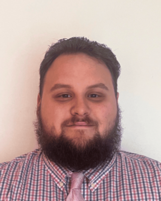 Photo of Logan Hess, Mental Health Counselor Associate, MA, LMHCA