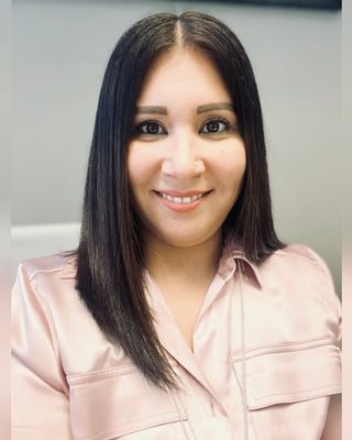 Photo of Elise Milagros Ruiz, LPC, LCMHC, CCTP, Licensed Professional Counselor