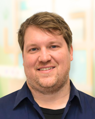 Photo of Andre Stam, Registered Psychotherapist, MACP, RP, OCT