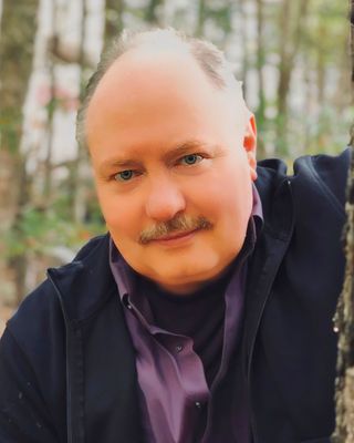 Photo of Dr. Mike Buckley, Counsellor, PhD, Psych, MA, RCT
